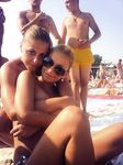 Nude Beach Sunbathing in Sunglasses on a White Towel