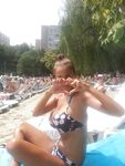 Nude Beach Sunbathing in Sunglasses on a White Towel