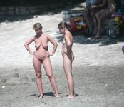 girl nudists get naked and heat up a public beach