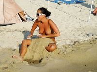A Phone in Hand During an Everyday Nude Beach Moment