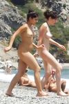 Gorgeous nude adult with a nice ass sunbathes