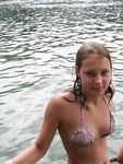 Gorgeous nude adult with a nice ass sunbathes