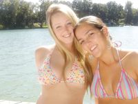 Curvaceous nude adult poses in the warm water