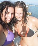At the nudist beach adult womans play around naked