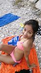 At the nudist beach adult womans play around naked
