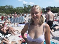 At the nudist beach adult womans play around naked