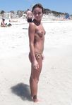 Hot babe sunbathes on nude beach