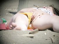 Encountered this smoking-hot babe on nude beach last month.