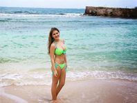 Encountered this smoking-hot babe on nude beach last month.