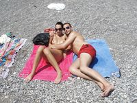 Candid adult woman naked on the nude beach in public!