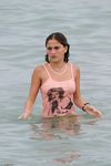 Candid adult woman naked on the nude beach in public!