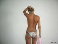 My wife walking around topless