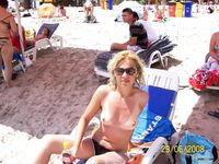 topless adults on barcelona beach
