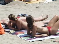 Topless Beach Girl With Firm Tits