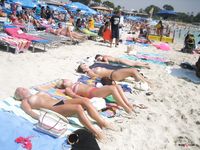 Topless Beach Girl With Firm Tits