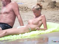 girl topless on beach in australia