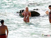 Nudist beach hairy pussy spread legs sunbath close-up