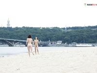 two girls at the nude beach