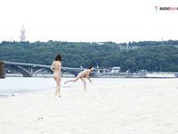 two girls at the nude beach