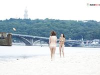 two girls at the nude beach