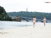 two girls at the nude beach