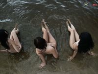Tracing Shapes Together Where Wet Sand Meets the Shoreline
