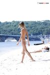 An Easy Sandy Beach Walk Backed by Lush Greenery