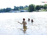 Wifwe immense boobies on OBX strand.