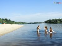 Wifwe immense boobies on OBX strand.