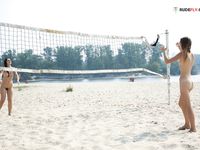 Wifwe immense boobies on OBX strand.