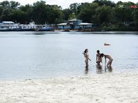 Mitchell mate Latonya, on a strand.