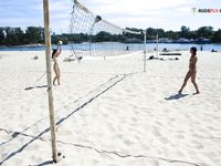 On a random plage next to sea.