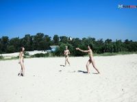 On a random plage next to sea.