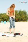 Topless on a Towel, Catching the Full Beach Sun