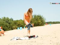 Topless on a Towel, Catching the Full Beach Sun