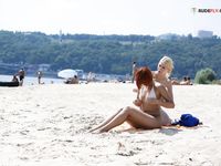 Taking a douche at a naturist resort.