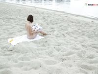 Nymphs dressing and undresing on strand