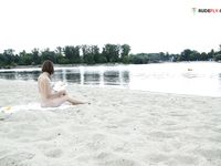 Nymphs dressing and undresing on strand