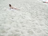 Nymphs dressing and undresing on strand