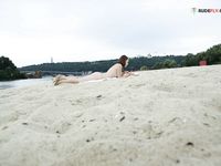 Nymphs dressing and undresing on strand