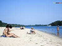 Having joy on the strand taking photos...