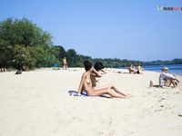 Having joy on the strand taking photos...