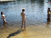 Braless strand around Mediterrean River...