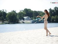 Braless strand around Mediterrean River...