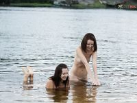 Waist-Deep Splashes Through Calm Open Lake Water
