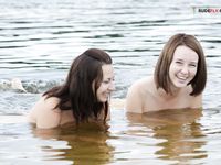Waist-Deep Splashes Through Calm Open Lake Water