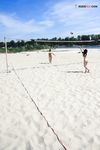 River Shallows Hold Three Nude Friends Under Summer Sun