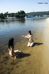 Lost in a Russian Paperback on a Sandy Nude Beach Towel