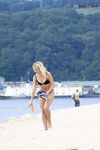 Lost in a Russian Paperback on a Sandy Nude Beach Towel
