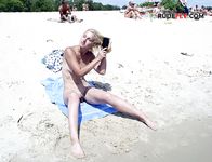 Sitting at the Shoreline on a Nude Beach